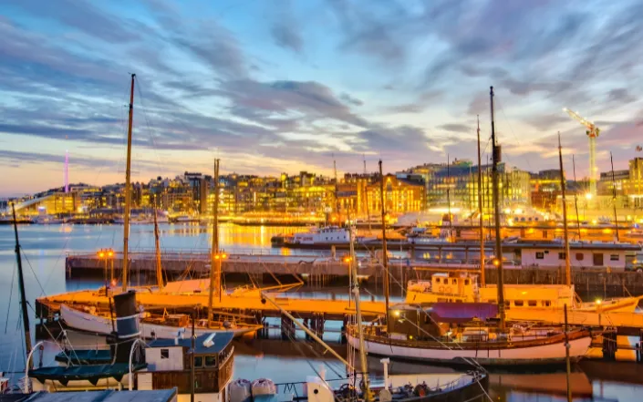 Oslo harbour and city skyline at sunset